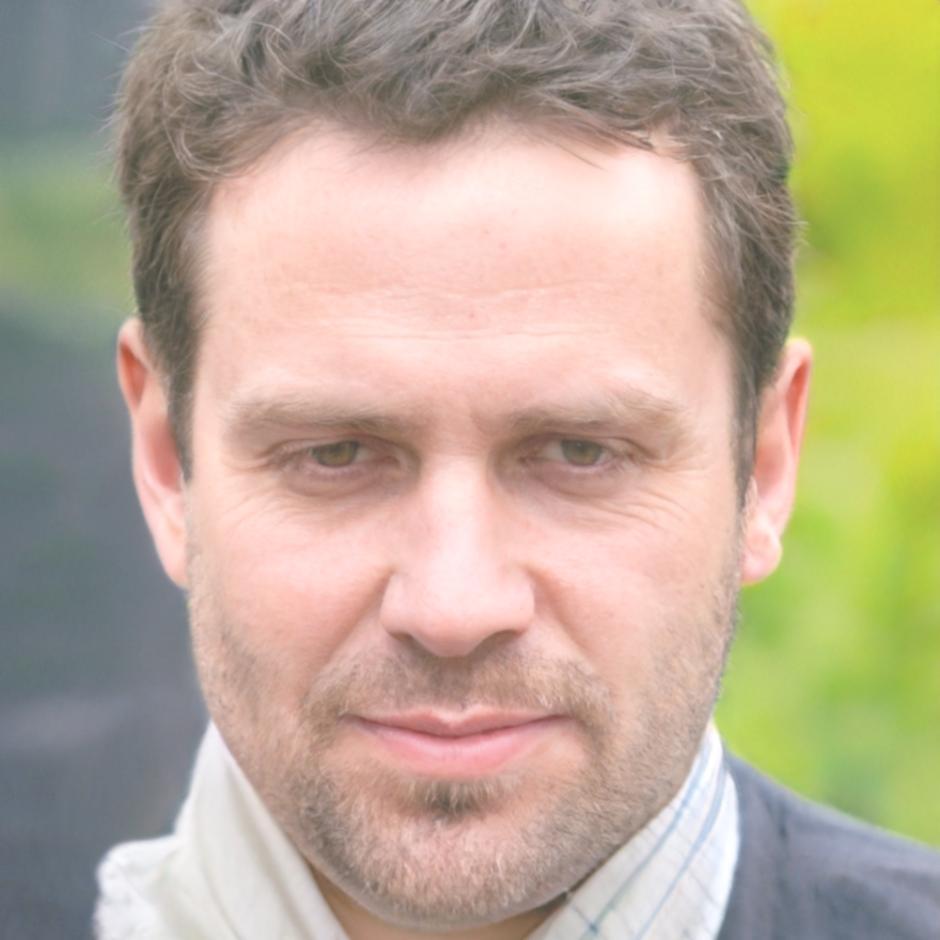 Professional headshot of testimonial provider